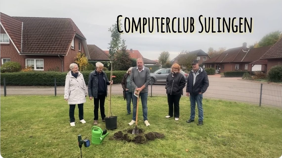 Mitglieder pflanzen einen Baum